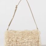 STELLA MCCARTNEY Cylindrical Shearling Shoulder Bag with Adjustable Handle